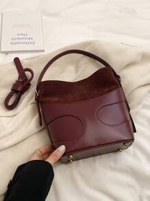 女士勃艮第色块水桶手提包，时尚优雅，适合通勤和购物，可手提或斜挎