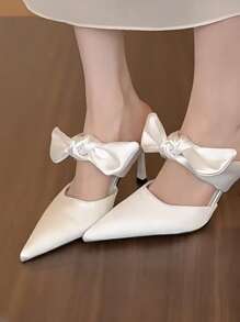 缎面尖头蝴蝶结穆勒鞋一脚蹬细高跟凉鞋，2025 年春夏新品系列