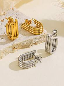 1 par de pendientes geométricos asimétricos en capas de acero inoxidable con líneas