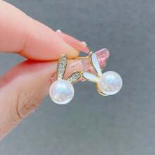 زوج من حلقات الأذن ذات أذني الأرنب اللطيفة المرصعة باللؤلؤ، إكسسوارات مجوهرات ذات تصميم أذن الأرنب من موضوع عيد الفصح، حلقات أذن لؤلؤية أنيقة، هدية مثالية لعيد الفصح