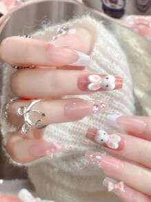 YTJ ¡Actualiza tu look de uñas postizas! 24 piezas de uñas postizas en forma de ataúd largas en un lindo moño rosa de conejo y un juego completo reutilizable de accesorios de diamantes, que incluye 1 botella de pegamento de gelatina y una lima de uñas, perfecto para fiestas, bailes y uso diario.