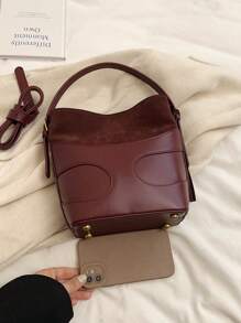 女士勃艮第色块水桶手提包，时尚优雅，适合通勤和购物，可手提或斜挎