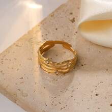 Dellgoo 1pc Stainless Steel Gold Hollow Wave Line Inlaid Crystal Ring