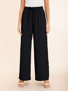 Pantalones dama con resorte para mujer con bolsillos laterales inclinados, líneas de costura visibles - Negro - Ver 1