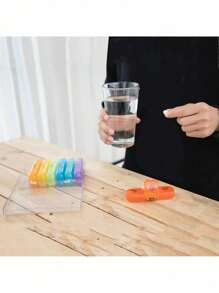 Boîte à médicaments noire avec 21 compartiments pour sept jours par semaine, boîte à médicaments hebdomadaire en plastique portable avec compartiments