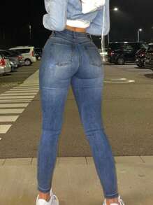 女式口袋破洞休闲紧身弹力牛仔裤