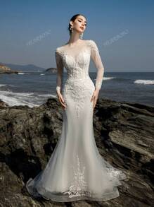 Vestido de novia sirena con entrenada, mangas largas, corset bordado con cuentas lujoso y noble de HEARBOBO para la novia