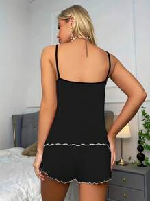Conjunto de 2 piezas con camisa de tirantes y manga corta con estampe de oso negro
