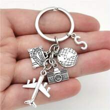 Llavero con tema de viaje de 26 letras con encantos de avión, globo y cámara - Llavero circular con alfabeto, regalo de cumpleaños y vacaciones, llavero casual de aleación de zinc, adecuado para accesorios de automóvil, dije de bolso, mochila para la escuela, gótico lindo y Y2k - Plata antigua - Ver 29