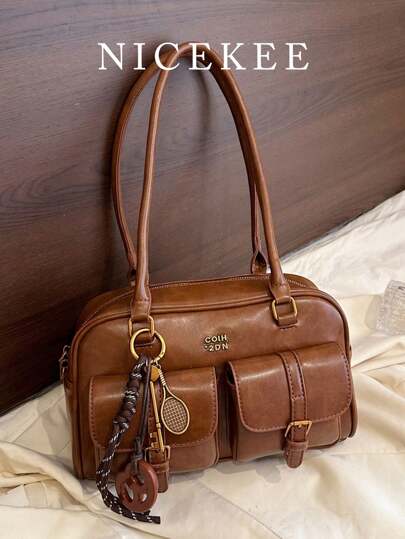 新款面包结吊坠多口袋枕形包，时尚多彩腋下包，复古简约高品质女士单肩包，日常、通勤、购物皆宜