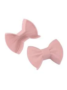 Mignon clip antibrûlure en silicone en forme de nœud. Clip d'isolation créatif en nœud en silicone résistant à haute température pour protéger les oreilles