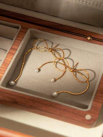 1 paire de boucles d'oreilles élégantes et minimalistes en acier inoxydable avec grand nœud, design unique convenant pour un port quotidien, la Saint-Patrick, le Ramadan, la saison des mariages en tant que cadeau pour les femmes
