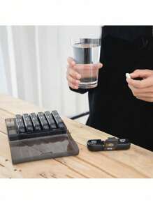 Boîte à médicaments noire avec 21 compartiments pour sept jours par semaine, boîte à médicaments hebdomadaire en plastique portable avec compartiments