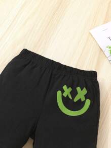 Set de 2 piezas, informal y lindo para niños pequeños, de algodón, suave, cómodo, transpirable, con capucha con estampado 3D de cara sonriente y pantalones cortos deportivos de unicolor, adecuado para el verano, el día a día, vacaciones y fiestas