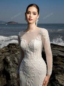 Vestido de novia sirena con entrenada, mangas largas, corset bordado con cuentas lujoso y noble de HEARBOBO para la novia