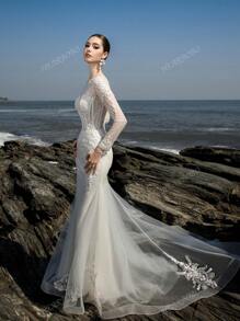Vestido de novia sirena con entrenada, mangas largas, corset bordado con cuentas lujoso y noble de HEARBOBO para la novia