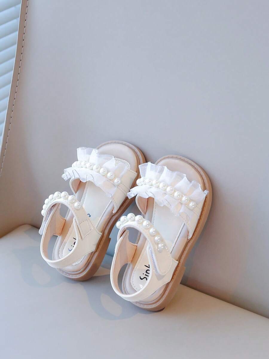 1 Đôi giày sandal đế mềm chống trượt cho bé gái, giày bệt phong cách công chúa viền ren và ngọc trai, thích hợp cho mùa hè - Màu be - Xem 1