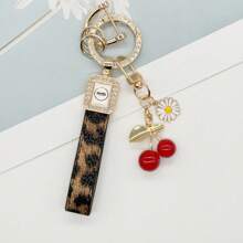TTOBS 1pc Exquisitely Crafted Leopard Print Leather Car Key Chain With Adorable Cherry Pendant - , Fashionable And Multi-Functional Backpack Keychain - The Perfect Accessory For Backpacks. The Perfect Valentine's Day Gift, Also An Ideal Gift For Your Beloved Girlfriend.