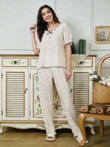 Pijama de 2 piezas conjunto de blusa de manga corta con estampado floral rojo y pantalón largo, blanco, con lazo, volantes en mangas y cuello cuadrado