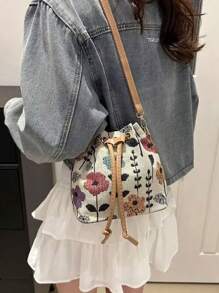 Bolso de tela chino mini nuevo Bolso de hombro de estilo nacional 2025 con caligrafía, bolso de cubo retro estampado para señoras, bolso de moda informal de primavera para señoras, bolso de mano con una cartera rosa de regalo