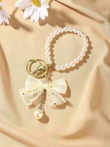 1pc Elegant Oversized Bow Pearl Keychain, Fashion Handbag Accessory With Gold-Color Hardware, Suitable For Bags And Phone Cases, Ideal Gift For Various Holidays