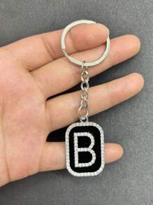 1PC Heren Zwarte Olie Druipende Metalen Legering Letter Sleutelhanger Is Geschikt Als Een Geschenk Hanger Voor Vrienden En Familie