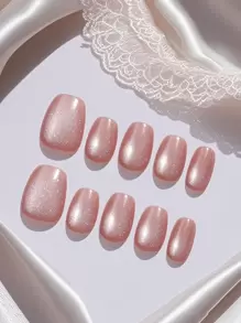 手工美甲配件套装，包括 10 件短椭圆形按压式指甲，可爱的粉色水晶猫眼设计，适合女孩、圣诞派对或日常佩戴，含 1 件指甲箔贴纸和 1 件指甲条用品 - 淺粉色 - 查看 6