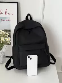 1个黑色时尚纯色大容量背包，带笔记本电脑隔层，返校季