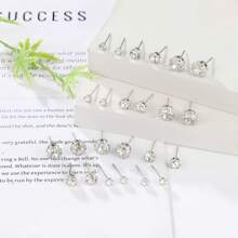 Ensemble de 24 boucles d'oreilles avec un style européen et américain . Boucles d'oreilles rondes en zirconium pour un look minimaliste élégant. Ensemble de boucles d'oreilles pour femmes.