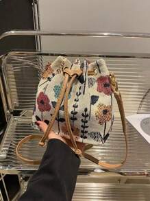 Bolso de tela chino mini nuevo Bolso de hombro de estilo nacional 2025 con caligrafía, bolso de cubo retro estampado para señoras, bolso de moda informal de primavera para señoras, bolso de mano con una cartera rosa de regalo
