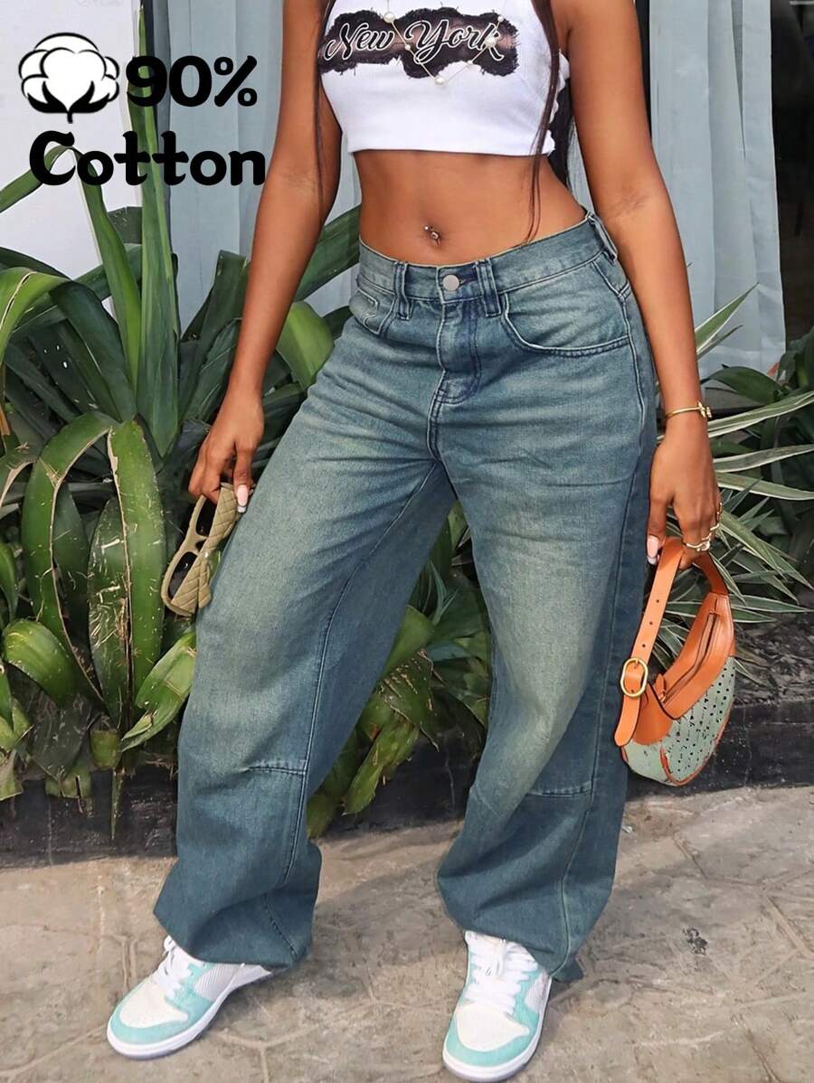 جينز بتصميم رجعي واسع الساق مغسول باللون الأزرق للنساء
