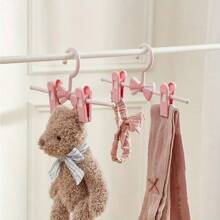 5pcs/1pc Adjustable Lovely Bowknot Non-Slip Clothes Hangers, Children Pants Hanger Clip, Space-Saving Expandable Hanger With Non-Slip Clips For Baby/Kids Clothes - Plastic Design - Multicolor - View 9