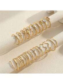 28 Stücke Set goldfarbener einfacher Strass-Herz-, Wellen-, und geometrischer Fingerringe, geeignet für den täglichen Gebrauch und Festivals von Frauen