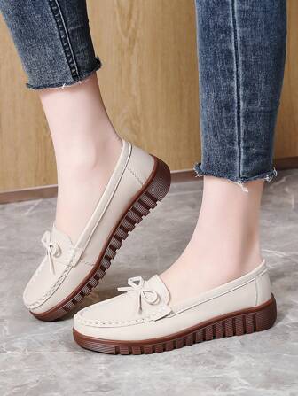 平底蝴蝶结一脚蹬女士休闲鞋，米色舒适防滑软底鞋，轻便透气中老年妈妈鞋