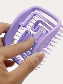 Cepillo de pelo de diseño hueco cuadrado, peine de color caramelo elástico y resistente sin deformación para masaje