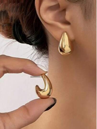 极简奢华泪珠设计时尚耳环，高端休闲优雅风格