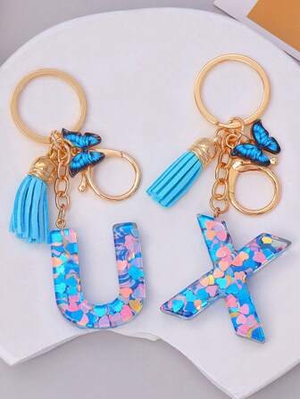 1pc Women's Initial Letter Black Butterfly Glitter Crystal Resin Epoxy Keychain With Butterfly Tassel Decor