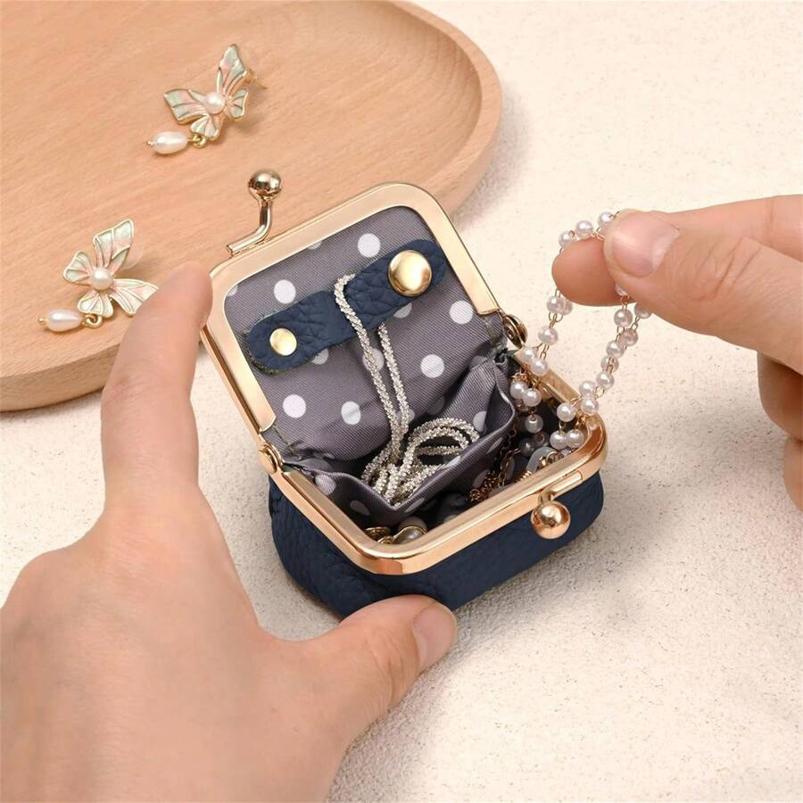 Mini Porta-Joias em Couro: Porta-moedas portátil em couro genuíno com inspiração vintage, organizador de joias com fecho de encaixe para anéis, brincos e colares. Carteira mini elegante em couro PU para mulheres, perfeita para presentes de Natal, acessórios de viagem e uso diário. Ideal para organizar sua coleção de joias preciosas com praticidade.