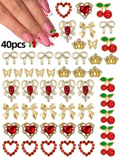 40 piezas Juego de decoraciones de uñas de aleación dorada - Diseño de cereza, corona, mariposa y lazo, incrustado con cristales rojos, elegante decoración de uñas para manualidades, fiestas y regalos