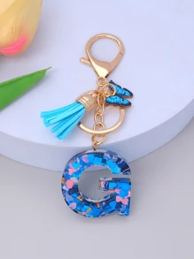 1pc Women's Initial Letter Black Butterfly Glitter Crystal Resin Epoxy Keychain With Butterfly Tassel Decor