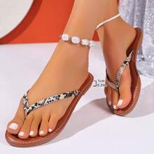 女士时尚平底人字拖，穿脱方便的轻便休闲凉鞋，适合室内、户外和海滩穿着 - 卡其色 - 查看 7