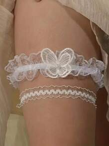 Seksowne dodatki do bielizny Eleganckie białe koronkowe paski na uda dla panny młodej, koronkowa kokarda, Eleganckie ślubne paski na uda dla panny młodej, Eleganckie akcesoria do podwiązek dla druhny
