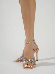 Sandali con tacco alto scintillanti da donna con decorazione di strass, cinturini incrociati in PVC trasparente e accenti in metallo argento, adatti per outfit estivi - Albicocca - Visualizzare 6