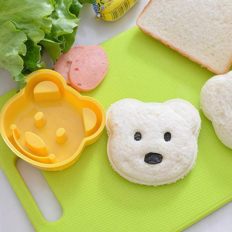 Molde para tartas con forma de oso de dibujos animados, herramienta de cocina para banquetes y San Valentín, utilizado para hacer tartas esponjosas, flanes, etc. Molde creativo con forma de oso de dibujos animados para sándwiches, herramienta DIY para el desayuno. La textura producida a mano de forma natural puede tener algunos arañazos ligeros, por lo que el molde para hacer panes y bolas de arroz se puede desmontar y lavar fácilmente.