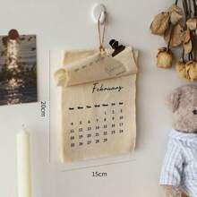 1pc 2025 Creative Linen Canvas Wall Calendar, Minimalist Beige Design With Monthly Layout, Ideal Gift For Home Or Office Decoration, Friends And Family (Without Hanging Hook)