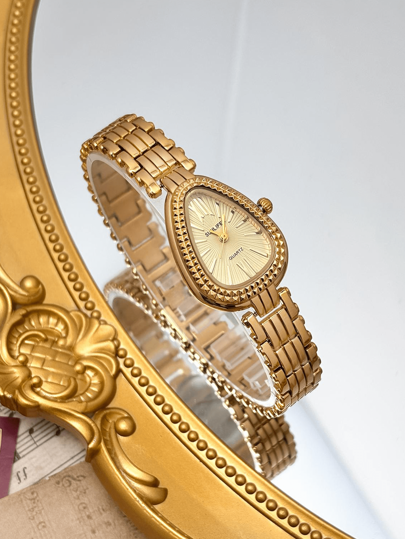 SUNLIFEX 1 ساعة يد نسائية عصرية بتصميم الرأس الأفعى الذهبي، طراز كاجوال فاخر وشخصي