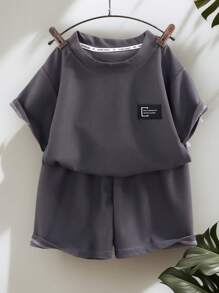 2 pezzi Completo estivo per bambini, Maglietta a maniche corte e set di pantaloncini per bambini e bambine, colore grigio leggero - Grigio - Visualizzare 3