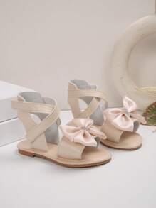 1 paire de sandales plates pour filles, de couleur unie avec des fleurs de marguerite, décor de fausses perles, PU antidérapant, confortable, de luxe, à la mode, bout rond, avec une bride à scratch, sandales casual adaptées aux activités extérieures, printemps/été 2025