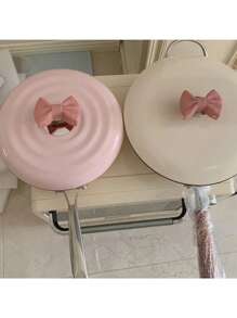 Mignon clip antibrûlure en silicone en forme de nœud. Clip d'isolation créatif en nœud en silicone résistant à haute température pour protéger les oreilles