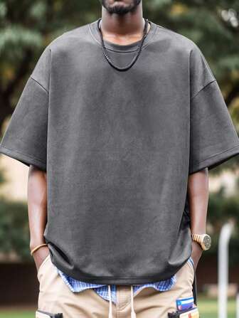 Camiseta de manga corta informal y deportiva de hombre de unicolor con caída de hombros y tejido suelta